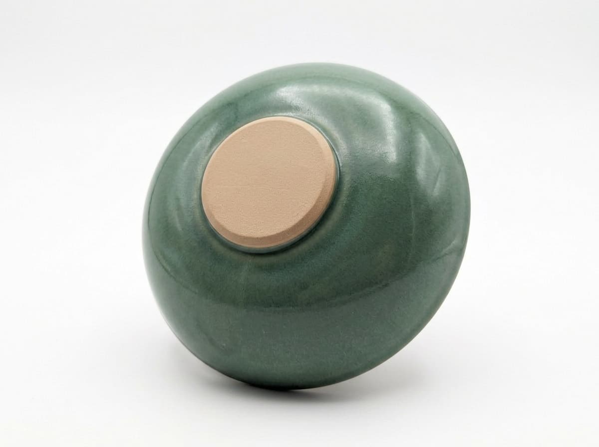 A glazed piece footed with the Solid Round Foot