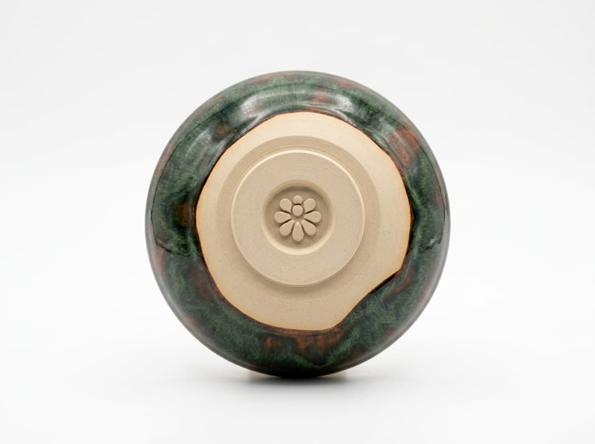 A glazed piece footed with the Daisy Foot
