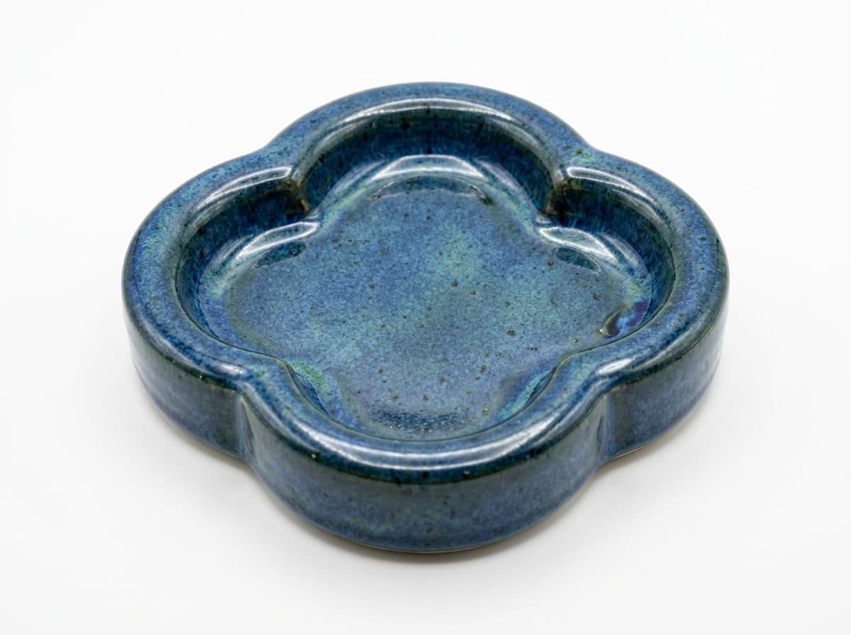 A glazed piece made over the Quatrefoil Puffy Rim form