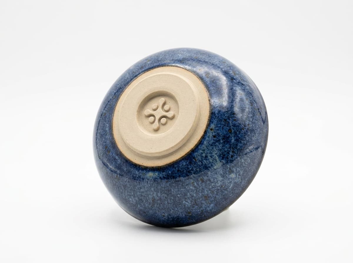 A glazed piece footed with the Rosette Foot